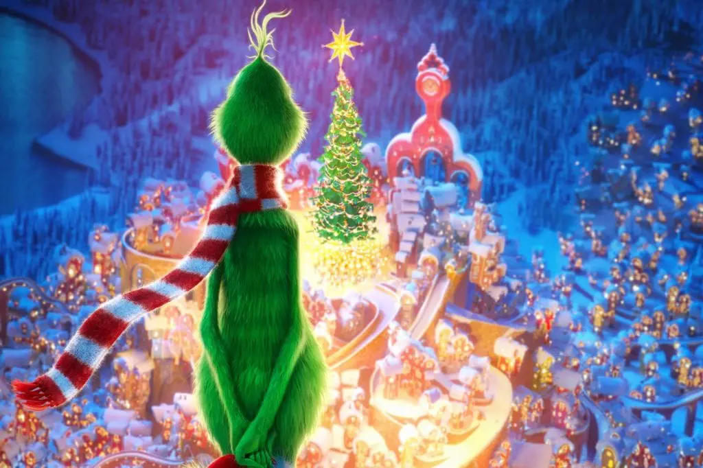 Grinch, stojący nad miastem. 