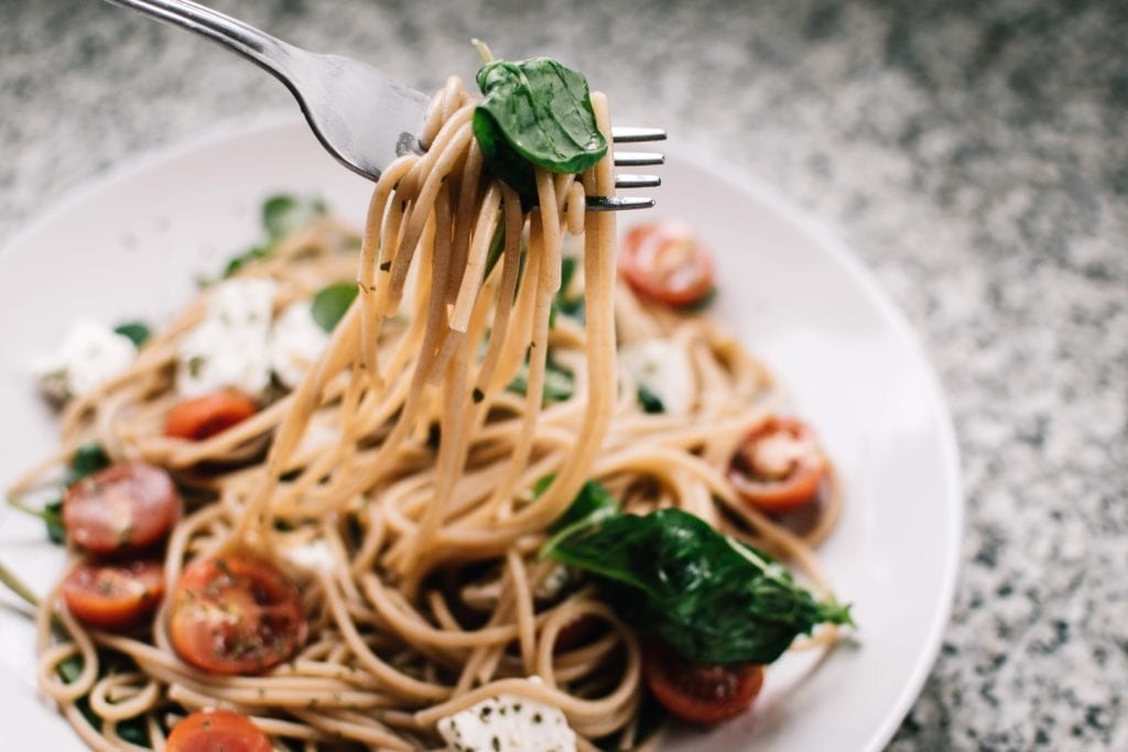 Selective-focus-photography-of-pasta-with-tomato-and-basil-1279330