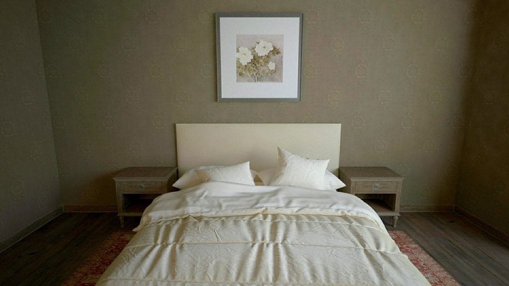 drewniane łóżko z białą pościelą